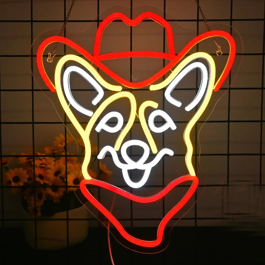 The image features a vibrant LED neon sign in the shape of a corgi dog wearing a cowboy hat.