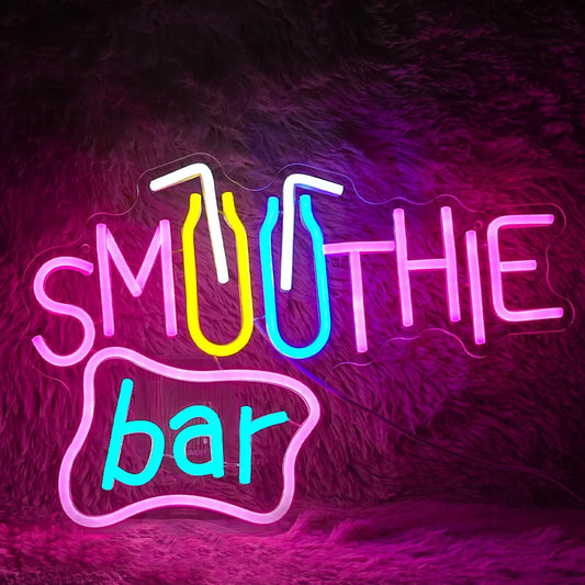 The image displays a vibrant LED neon sign that reads "Smoothie Bar" in a playful script font.