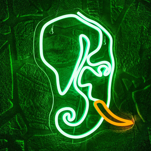 Um letreiro de LED neon vibrante em formato de elefante, com um brilho suave em tons de branco suave e rosa pastel.