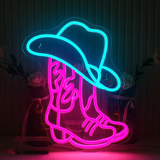 The image depicts a vibrant LED neon sign featuring a stylized design of a cowboy boot and hat.