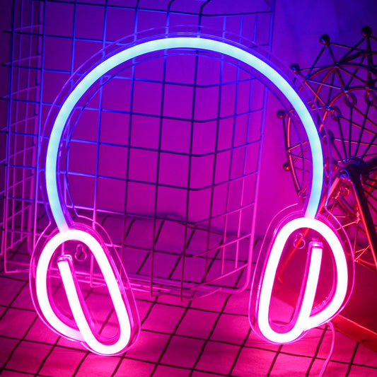 The image features a vibrant, handmade LED neon sign in the shape of headphones.