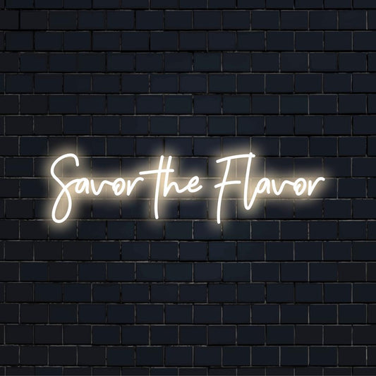 Glowing Savor The Flavor LED neon sign, perfect for modern decor, captures trendy aesthetic and ambient lighting style.