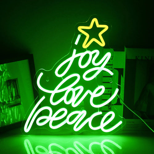 Um letreiro de LED neon vibrante em formato de árvore de Natal clássica é exibido contra um fundo escuro.