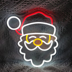 A imagem mostra uma placa de LED neon brilhante e festiva com os dizeres "Feliz Natal".