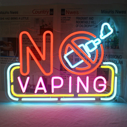 The image showcases a vibrant, handmade LED neon sign that reads "No Vaping.