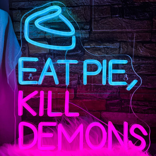 The image features a handmade LED neon sign displaying the phrase "Eat Pie Kill Demons.