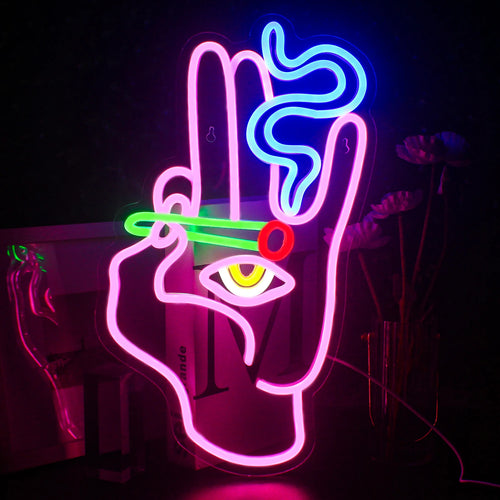 A imagem mostra um letreiro de LED neon no formato de uma mão artística segurando um cigarro, com fumaça subindo em espiral.