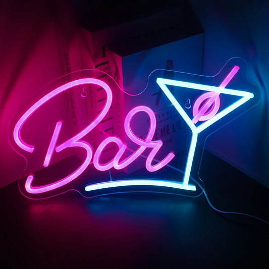 The image displays a vibrant LED neon sign depicting a stylized wine glass.