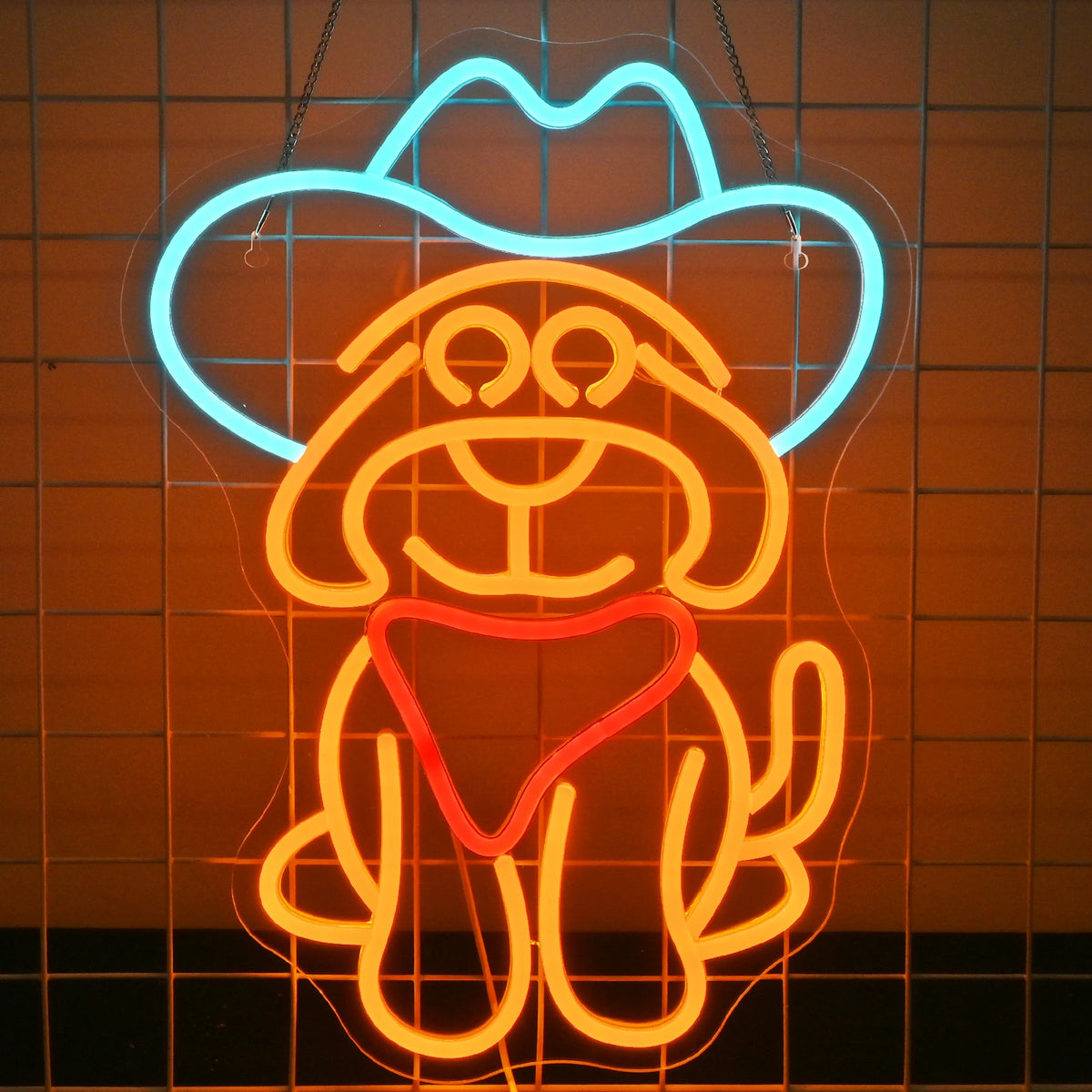 Uma vibrante placa de LED neon representando um cão cowboy estilizado.