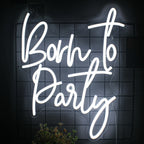 A imagem apresenta uma vibrante placa de LED neon com os dizeres "Born to Party".