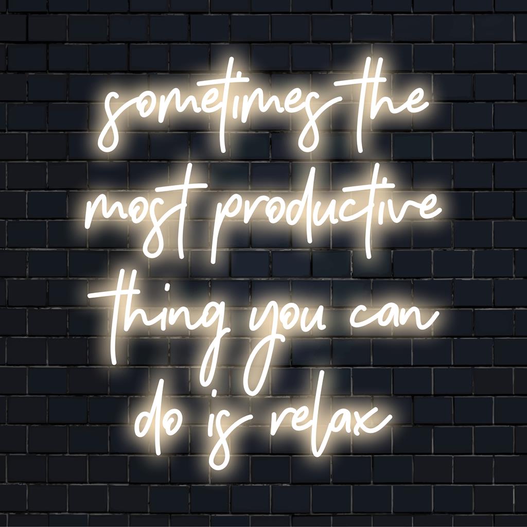 Custom LED neon sign in calming blue, featuring the quote Sometimes The Most Productive Thing You Can Do Is Relax.