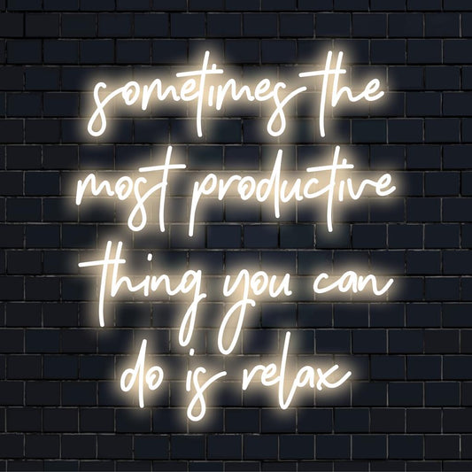 Custom LED neon sign in calming blue, featuring the quote Sometimes The Most Productive Thing You Can Do Is Relax.