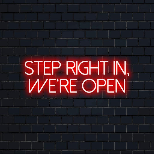 Custom LED neon sign reading Step Right In, We're Open in vibrant colors, perfect for eye-catching illumination and style.