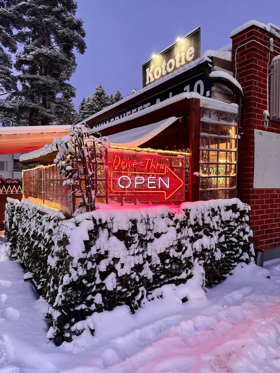 Outdoor Drive-Thru OPEN LED neon sign at Kototie restaurant in snowy Seinäjoki