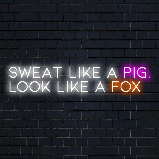 Uma placa de LED neon com o texto Sweat Like A Pig, Look Like A Fox, misturando arte motivacional com decoração de luz elegante.