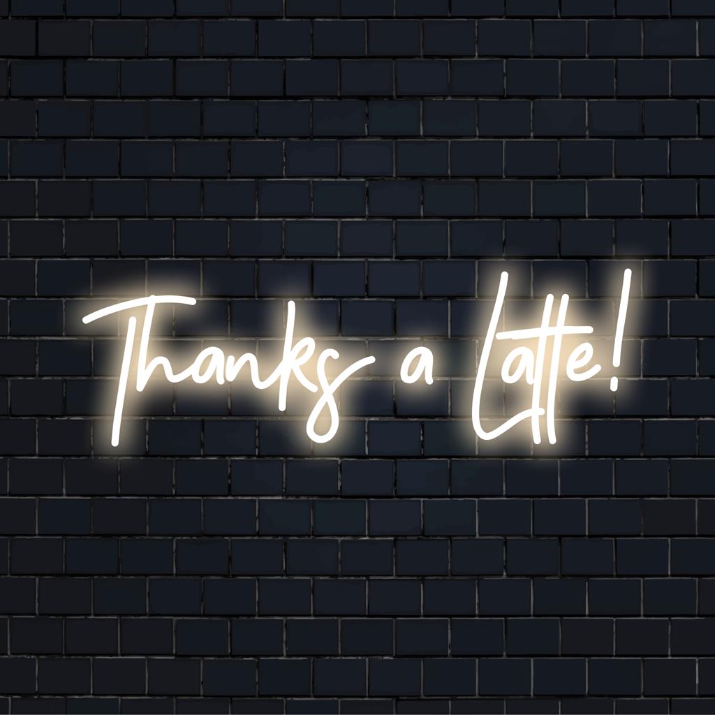 Placa de LED neon vibrante com a inscrição "Thanks A Latte!" e letras cursivas divertidas, um charme perfeito para cafeterias ou uma peça de decoração peculiar.