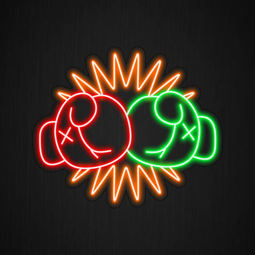 O letreiro de neon "Duas mãos com luvas de boxe batendo uma na outra" acrescenta intensidade com seu design dinâmico, lançando um brilho energético que celebra a paixão e a ação do boxe no seu espaço.