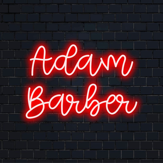 Adam Barber Personalized Neon Light with glowing wall decor on dark brick wall
