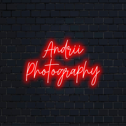 Andrii Photography Personalized Neon Light with glowing neon text on dark brick background