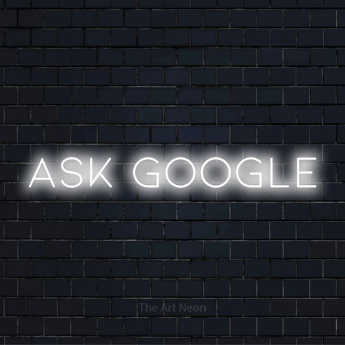 "Ask Google" glowing LED neon sign on a black brick wall