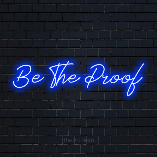"Be The Proof" LED neon sign on a black brick wall