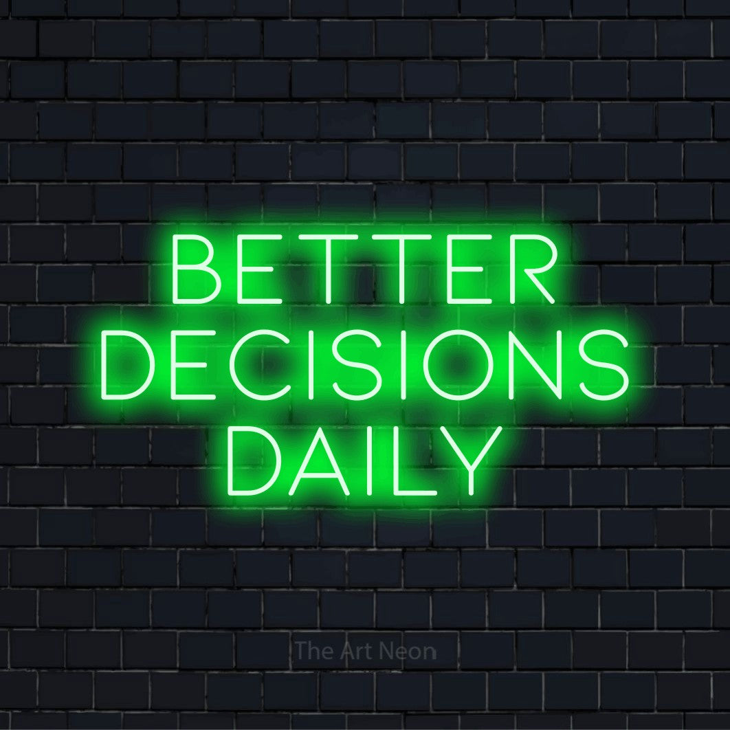 "Better Decisions Daily" glowing LED neon sign on a black brick wall