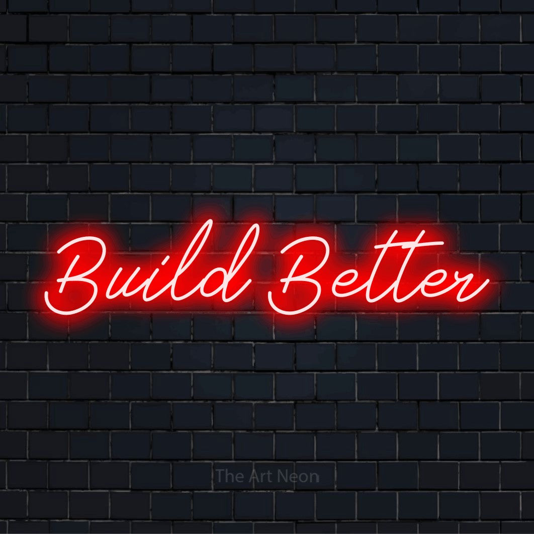 "Build Better" neon text design on a black brick wall