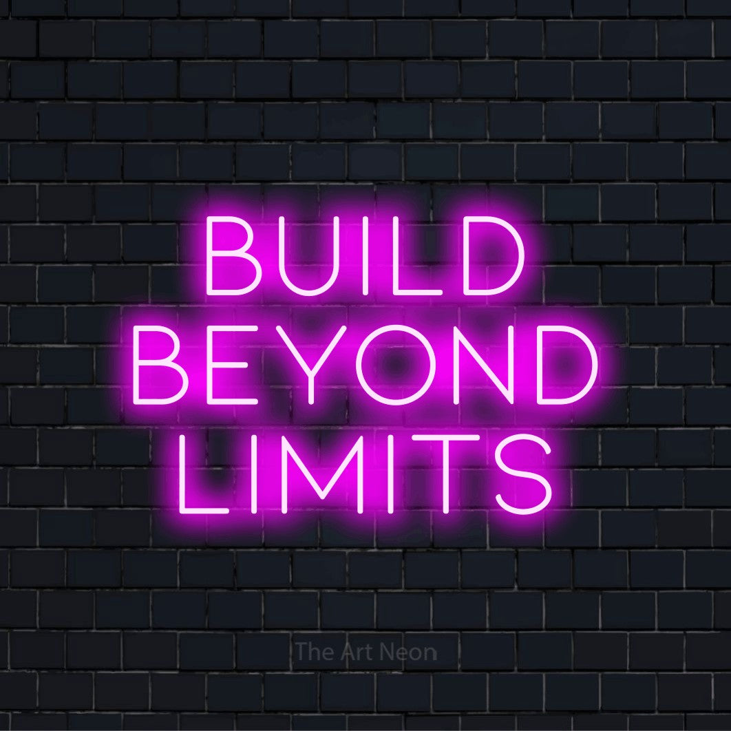 "Build Beyond Limits" script-style LED neon sign on a black brick wall