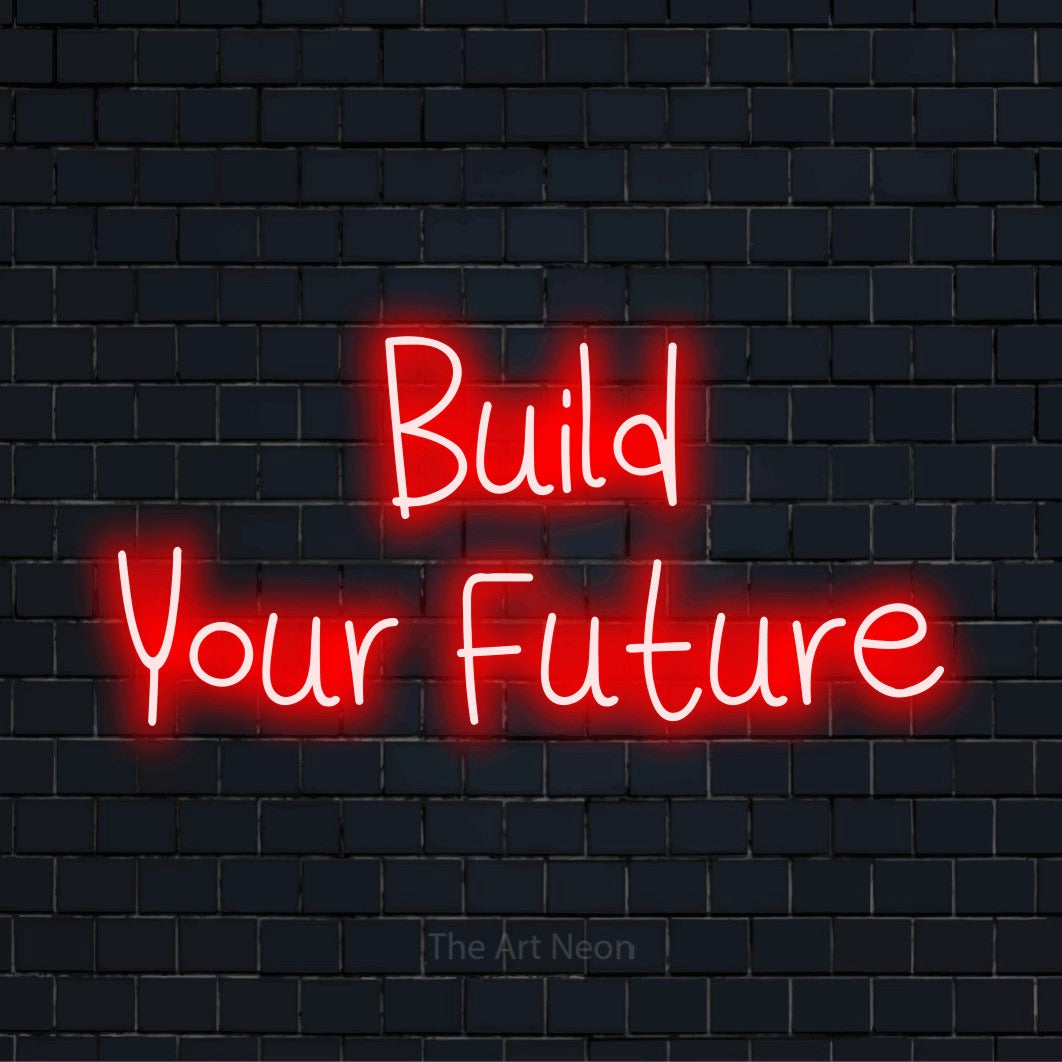 "Build Your Future" glowing LED neon sign on a black brick wall