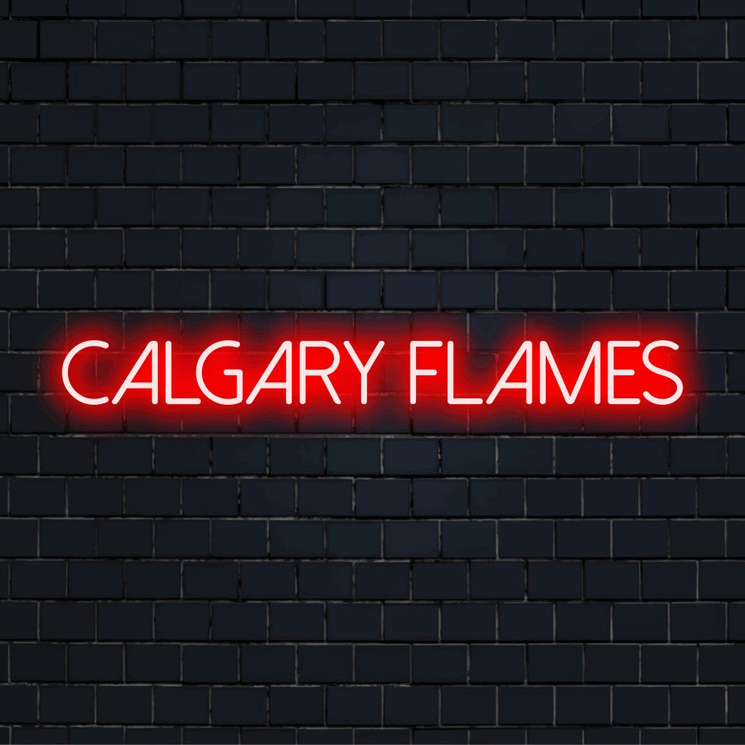 Calgary Flames Neon Light with glowing lettering on dark brick wall