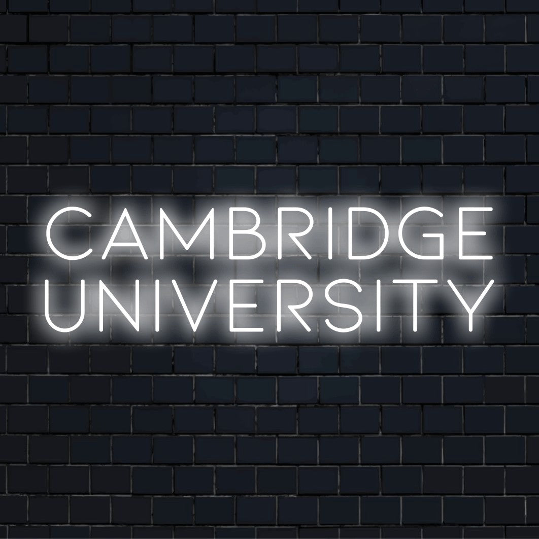 Cambridge University Neon Sign, glowing lettering on black brick background