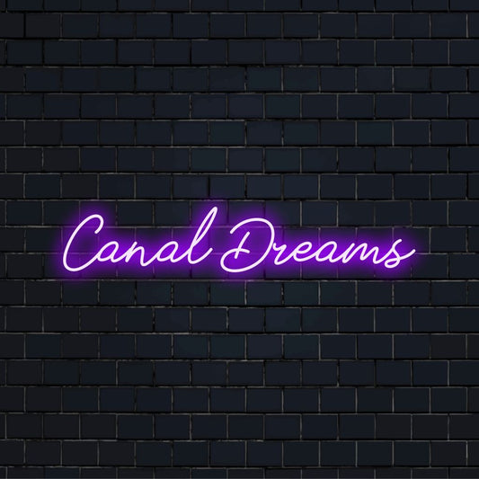 Canal Dreams LED Neon Sign, bright neon lettering on dark brick background