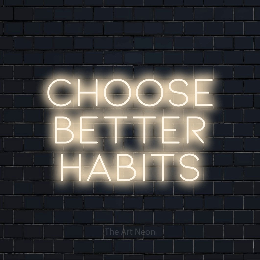 "Choose Better Habits" LED neon sign on a black brick wall