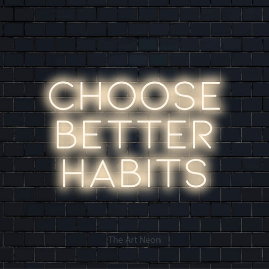 "Choose Better Habits" LED neon sign on a black brick wall