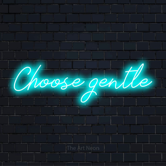 "Choose Gentle" neon text design on a black brick wall