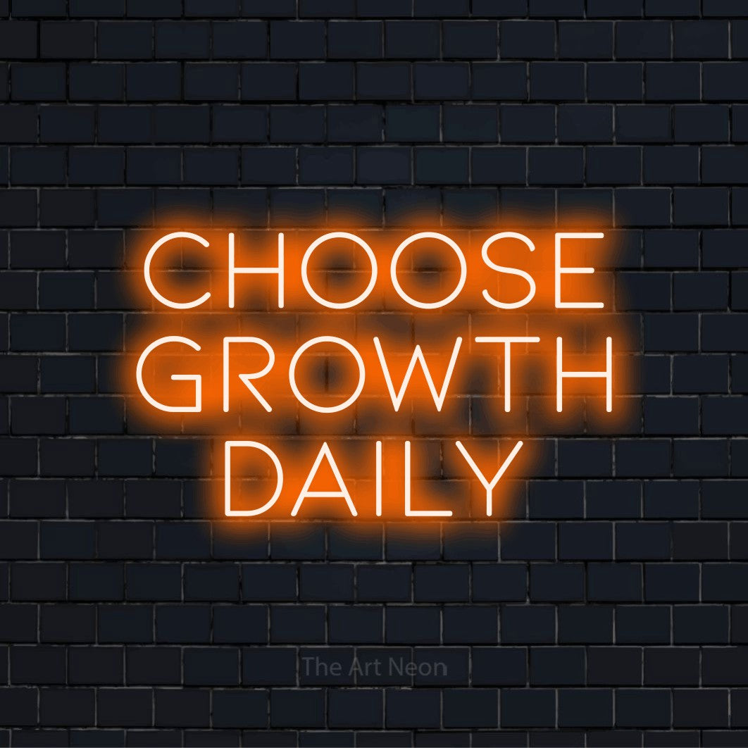 "Choose Growth Daily" text design with neon effect on a black brick wall