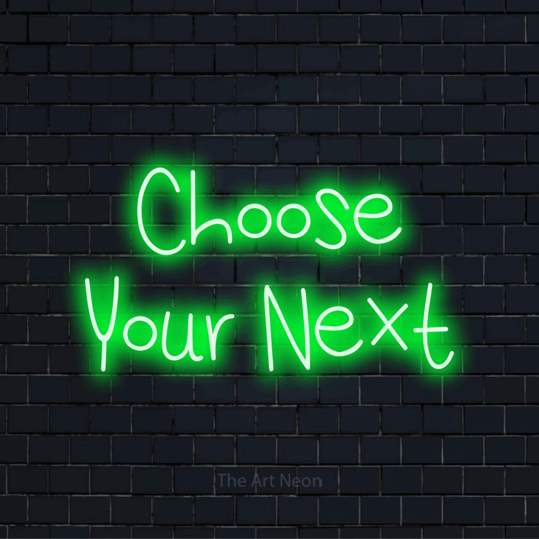 "Choose Your Next" glowing LED neon sign on a black brick wall