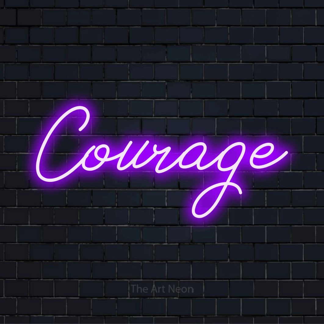 "Courage" LED neon sign on a black brick wall