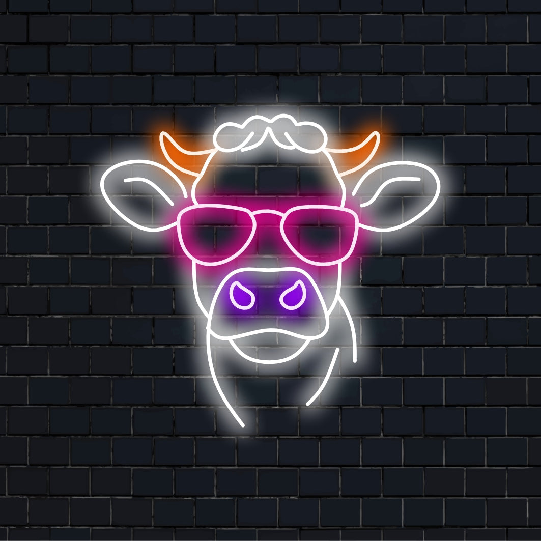 Cow Sunglasses LED Neon Sign, glowing wall decor against black brick wall