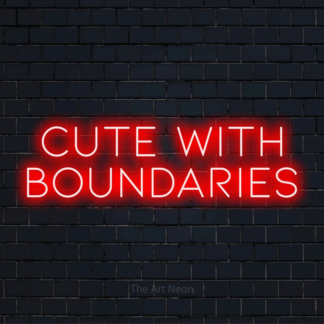 "Cute With Boundaries" LED neon sign on a black brick wall