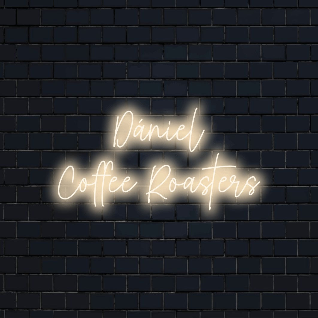 Daniel Coffee Roasters Custom Name Neon Sign, glowing neon text on black brick background