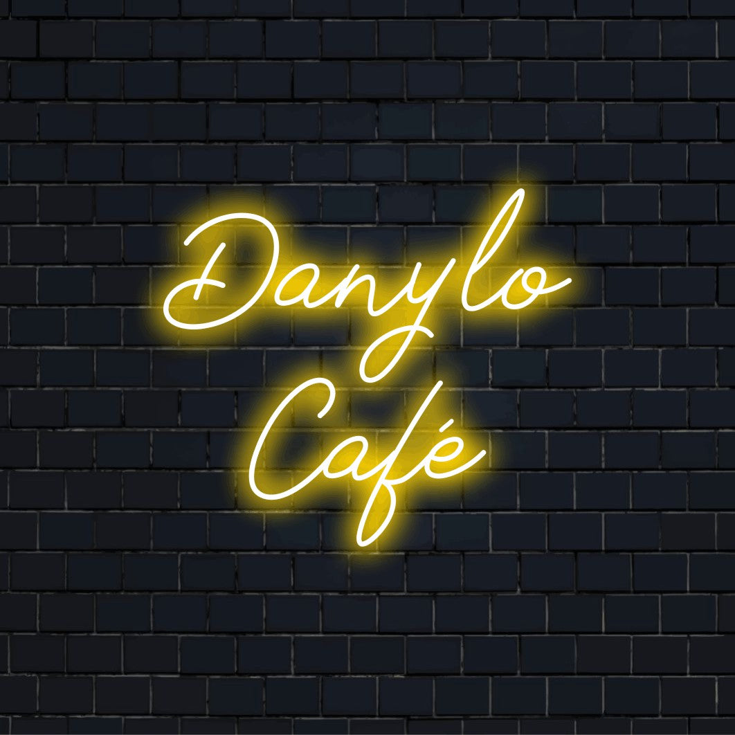 Danylo Cafe Custom Name Neon Sign, neon text light on dark brick background