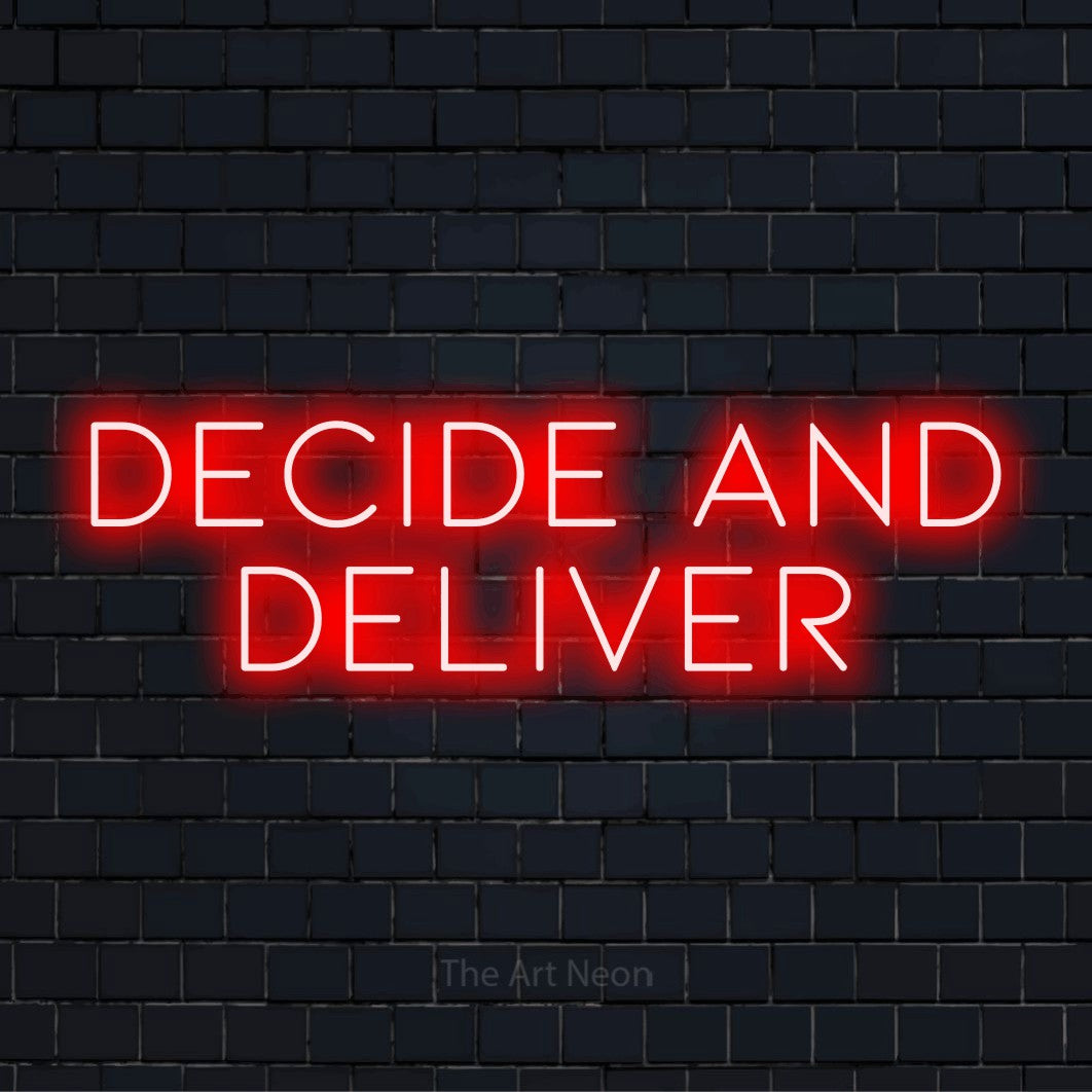 "Decide And Deliver" LED neon sign on a black brick wall