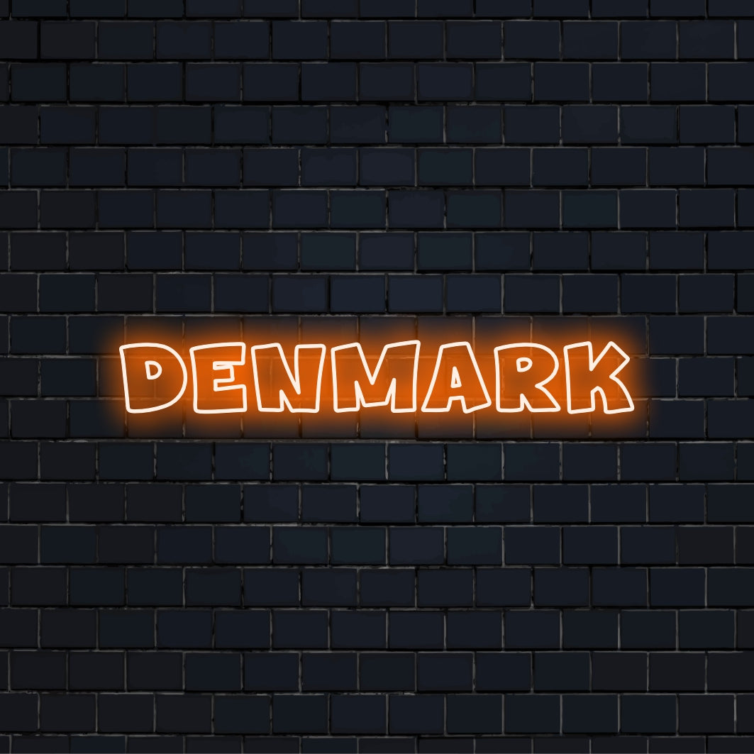 Denmark Neon Sign, bright neon lettering against brick backdrop