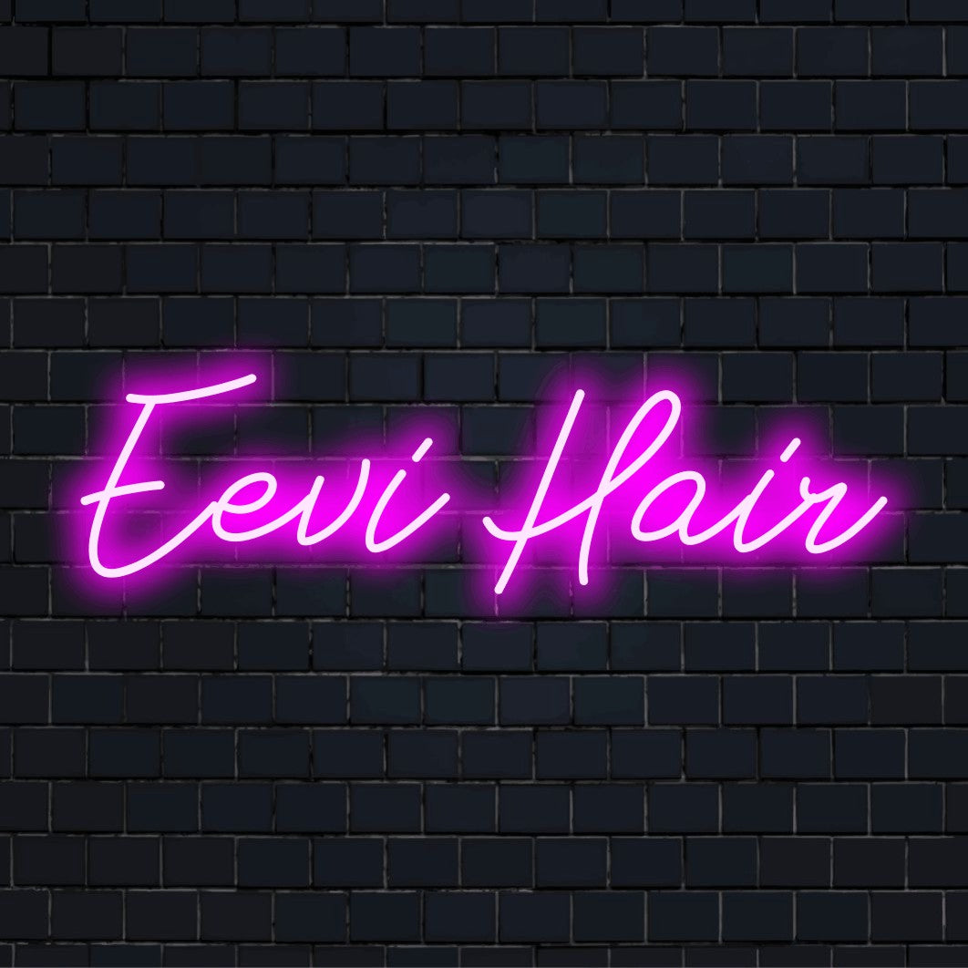 Eevi Hair Personalized Neon Light with soft neon glow against brick backdrop