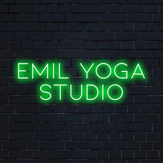 Emil Yoga Studio Custom Name Neon Sign, glowing neon text against brick backdrop