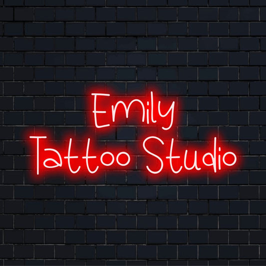 Emily Tattoo Studio Custom Name Neon Sign, bright LED glow against brick backdrop