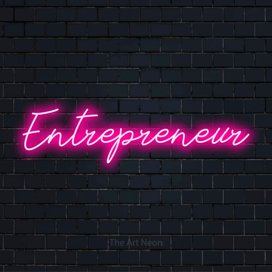 "Entrepreneur" glowing LED neon sign on a black brick wall