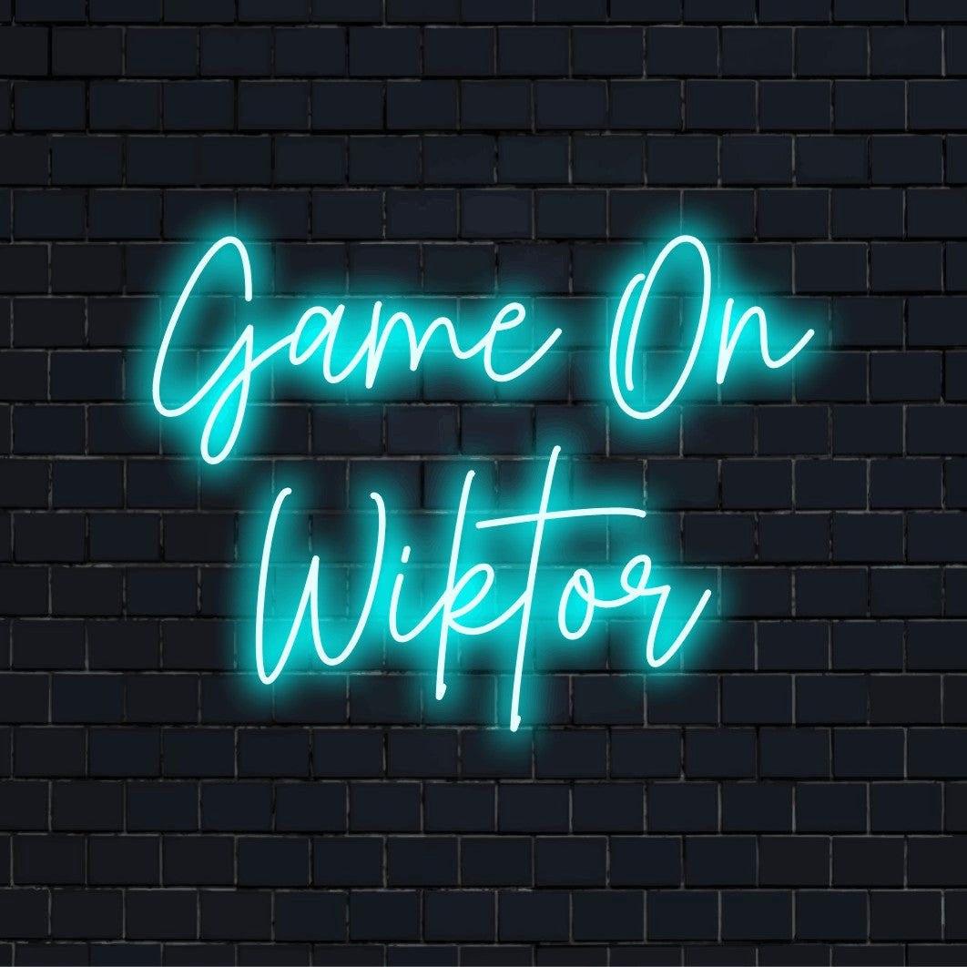 Game On Wiktor Personalized Neon Light with soft neon glow against brick backdrop