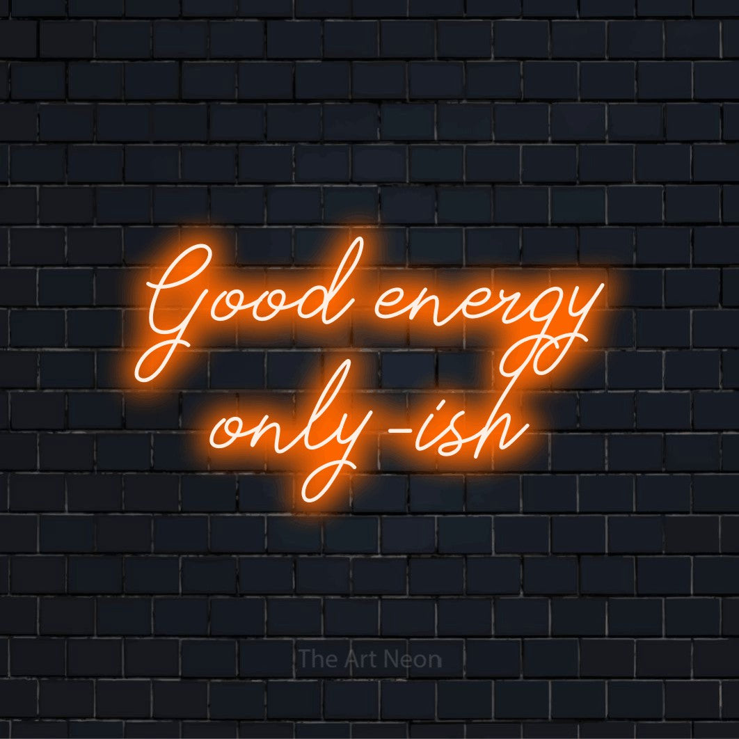"Good Energy Only-ish" neon text design on a black brick wall